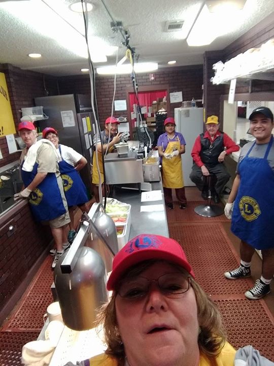 Lion Verna Taking A Selphie w/ Her Food Booth Crew