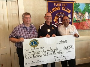Plant City Lions Presents George Newman from Meals On Wheels of Plant City With A Donation Check